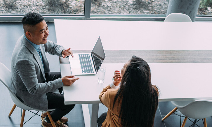 Co-workers collaborating