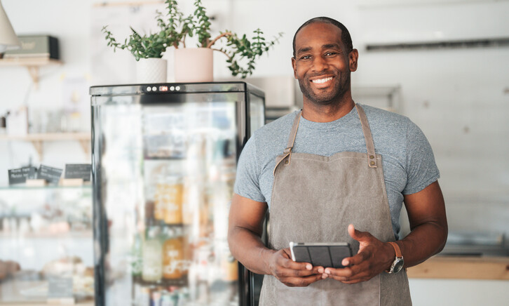 Small business owner with tablet