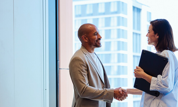A business meeting ends with a handshake
