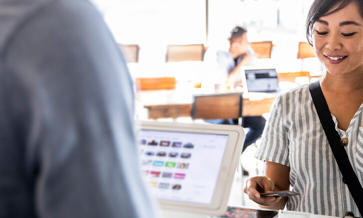 Person buying coffee