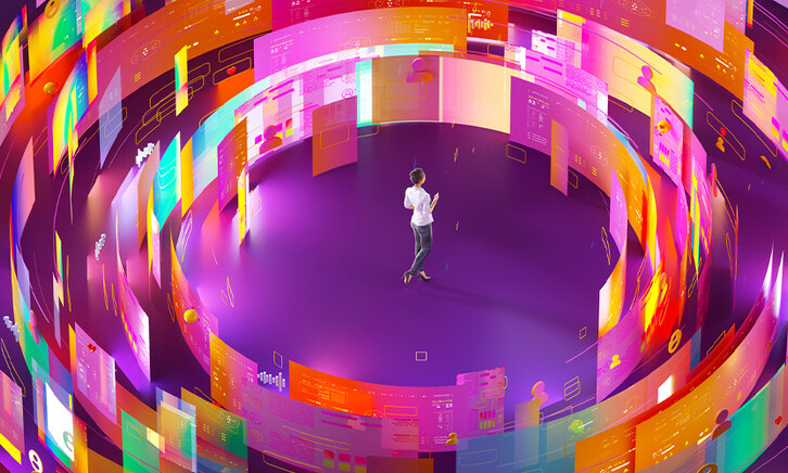 Person surrounded by screens