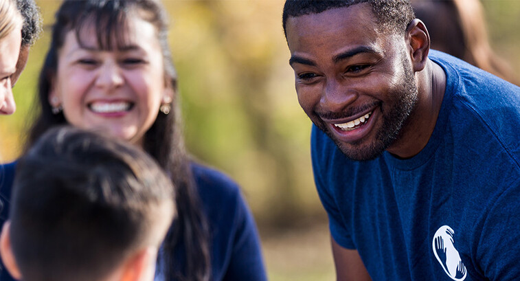 Multi-racial group of nonprofit volunteers