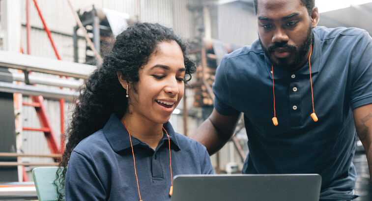 Workers in a manufacturing facility