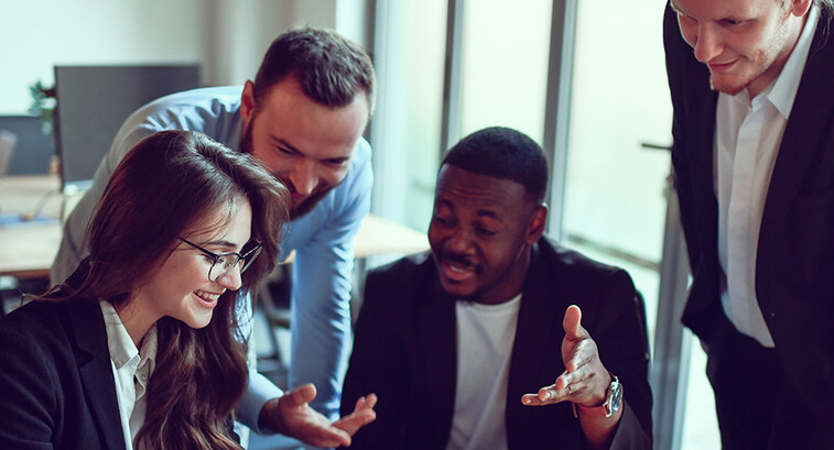 IT leaders in a modern workspace