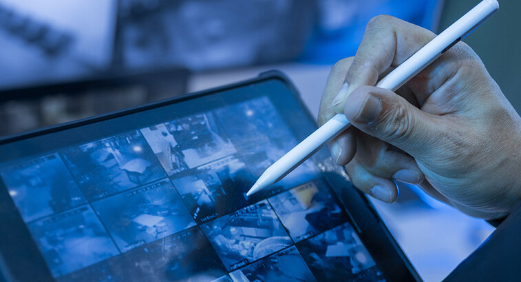Security guard using tablet