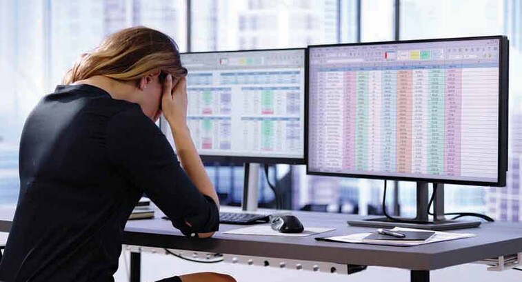 Person working on spreadsheet