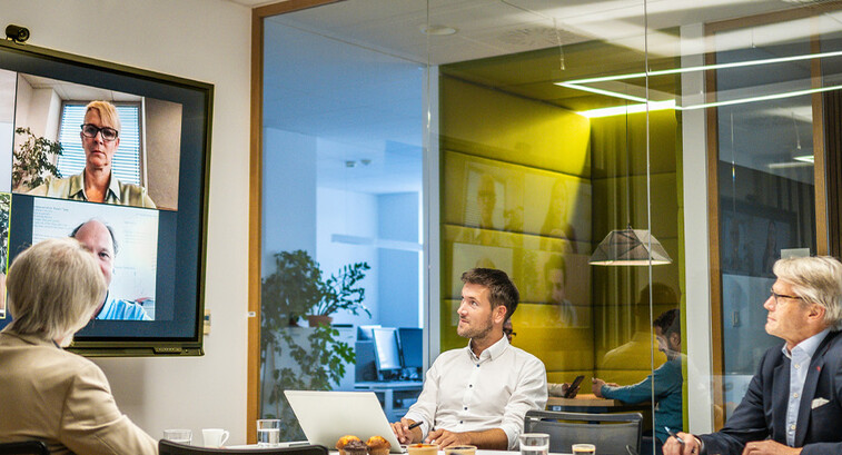 People in a hybrid workspace