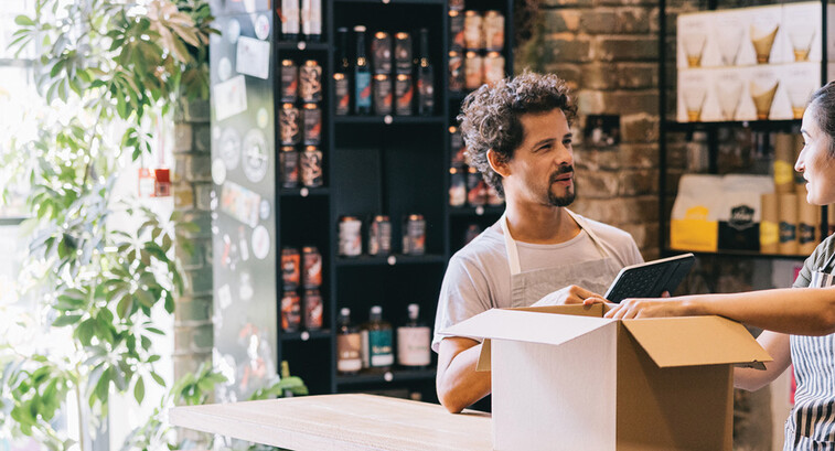 Small business owners working together in a shop