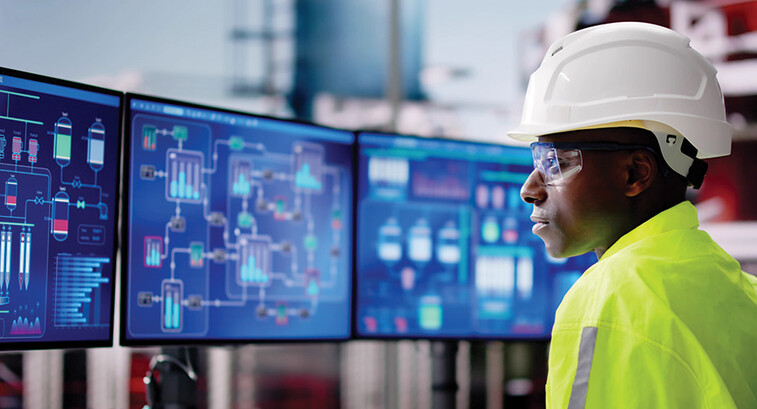 E&U worker looks at data