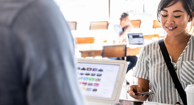 Person buying coffee
