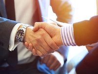 Bank fintech partnership business people handshake 