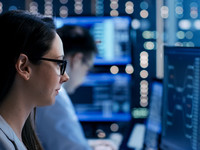 Woman working in cybersecurity 