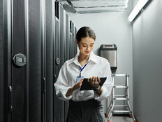 IT professional monitoring data center
