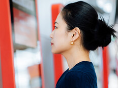 Person using touchscreen kiosk