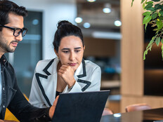 Coworkers collaborating in the office