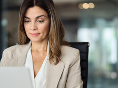 Image of a financial IT leader working on compliance