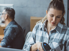 Small business owners processing orders