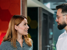 Co-workers talking in the office