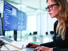 Employee reading computer screen