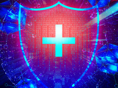 Shield with code in the background