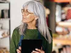 small business owner on tablet