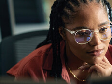 A business leader is coding