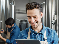 brewery owner looks at data