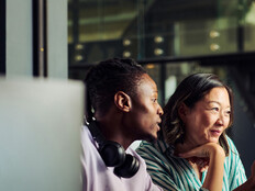 2 people at computer screens