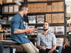 A group of colleagues having a discussion in a workshop