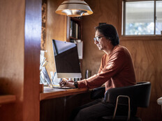 Man looking serious at a computer
