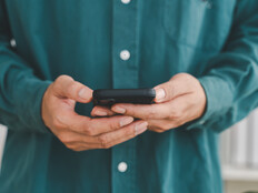 Businessman holding smartphone