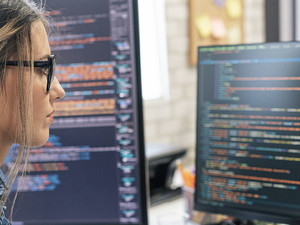 Person coding in the office