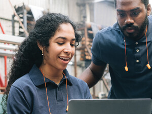 Workers in a manufacturing facility