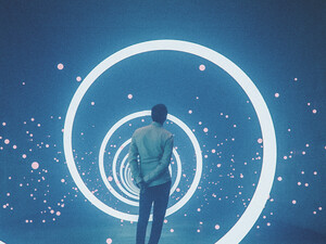 Abstract image of a man looking into his IT environment 