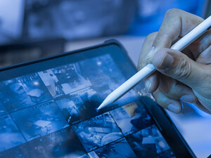 Security guard using tablet