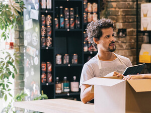 Small business owners working together in a shop