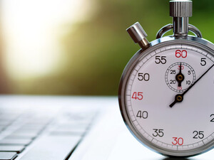 Stopwatch on laptop keyboard