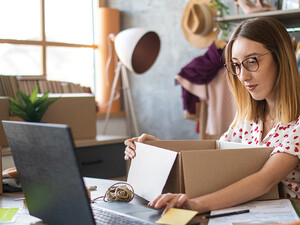 A business owner completes an order