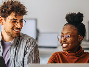 coworkers at an office collaborate