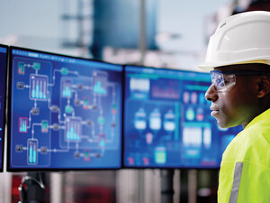 E&U worker looks at data