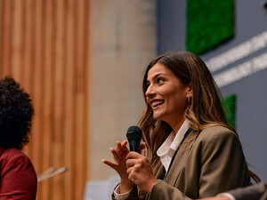 People speaking at conference