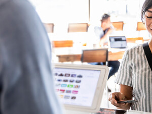 Person buying coffee