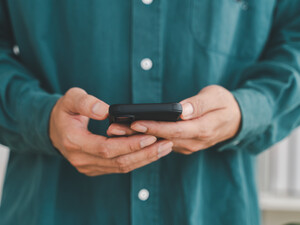 Businessman holding smartphone