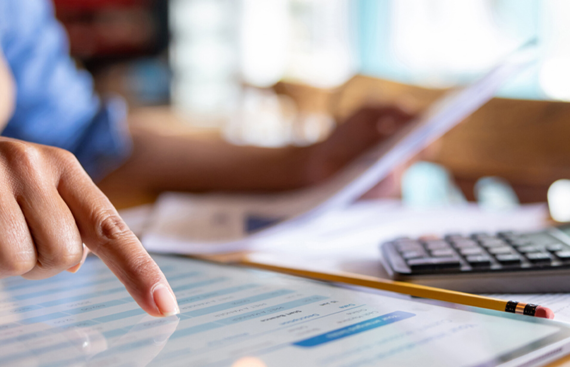 Person calculating business expenses