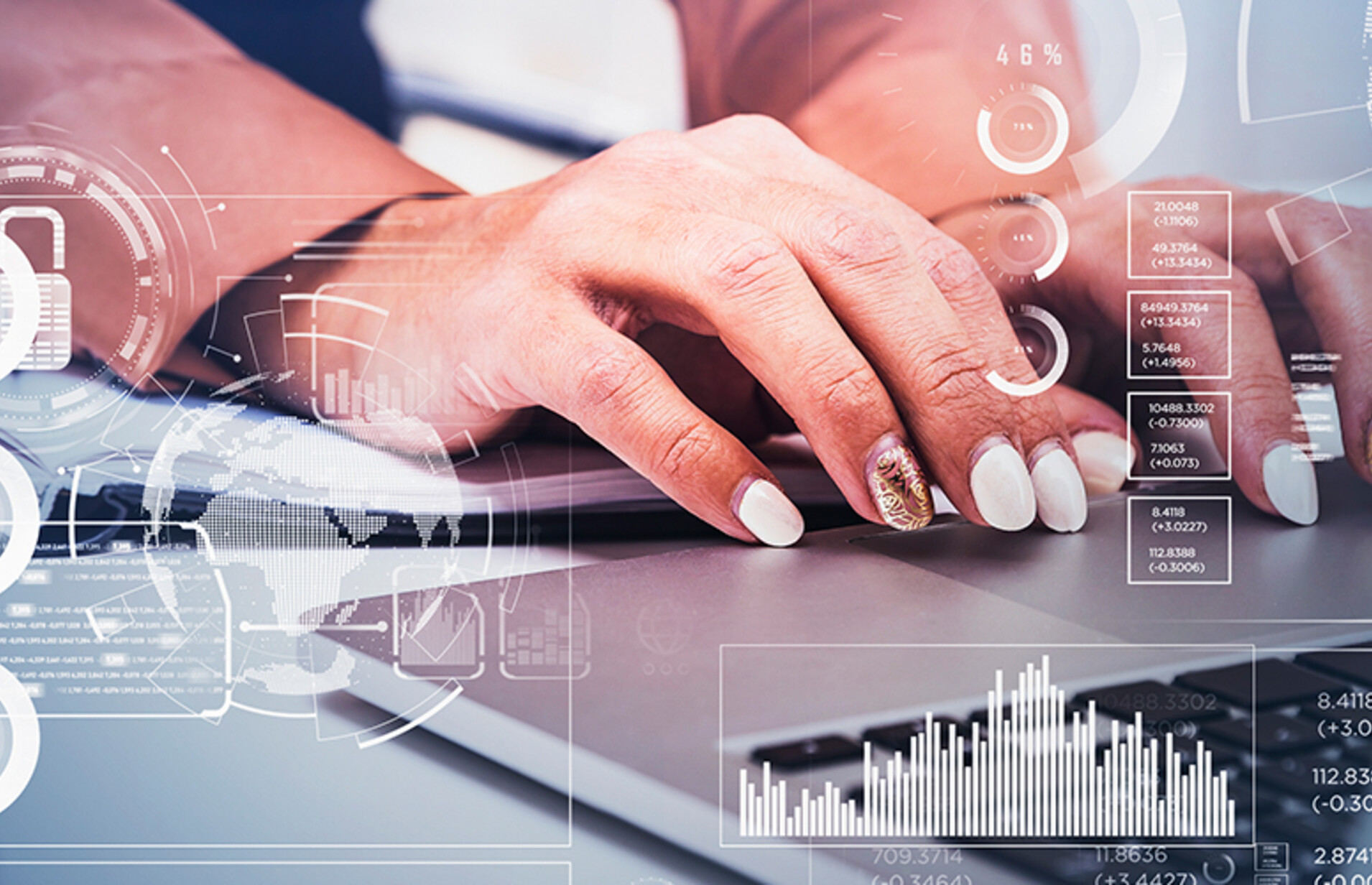 Business women typing on laptop.
