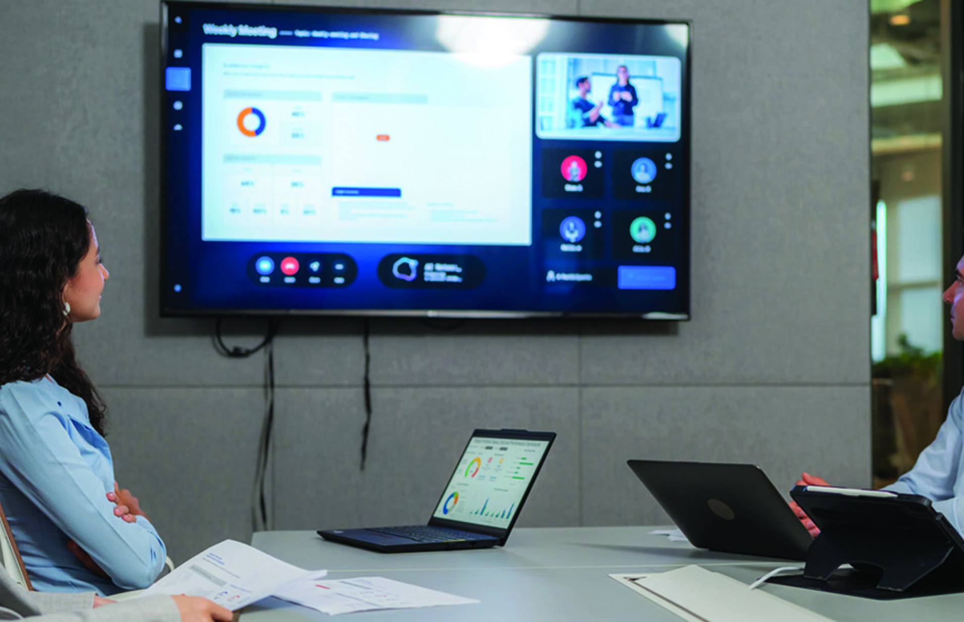 People reviewing screen