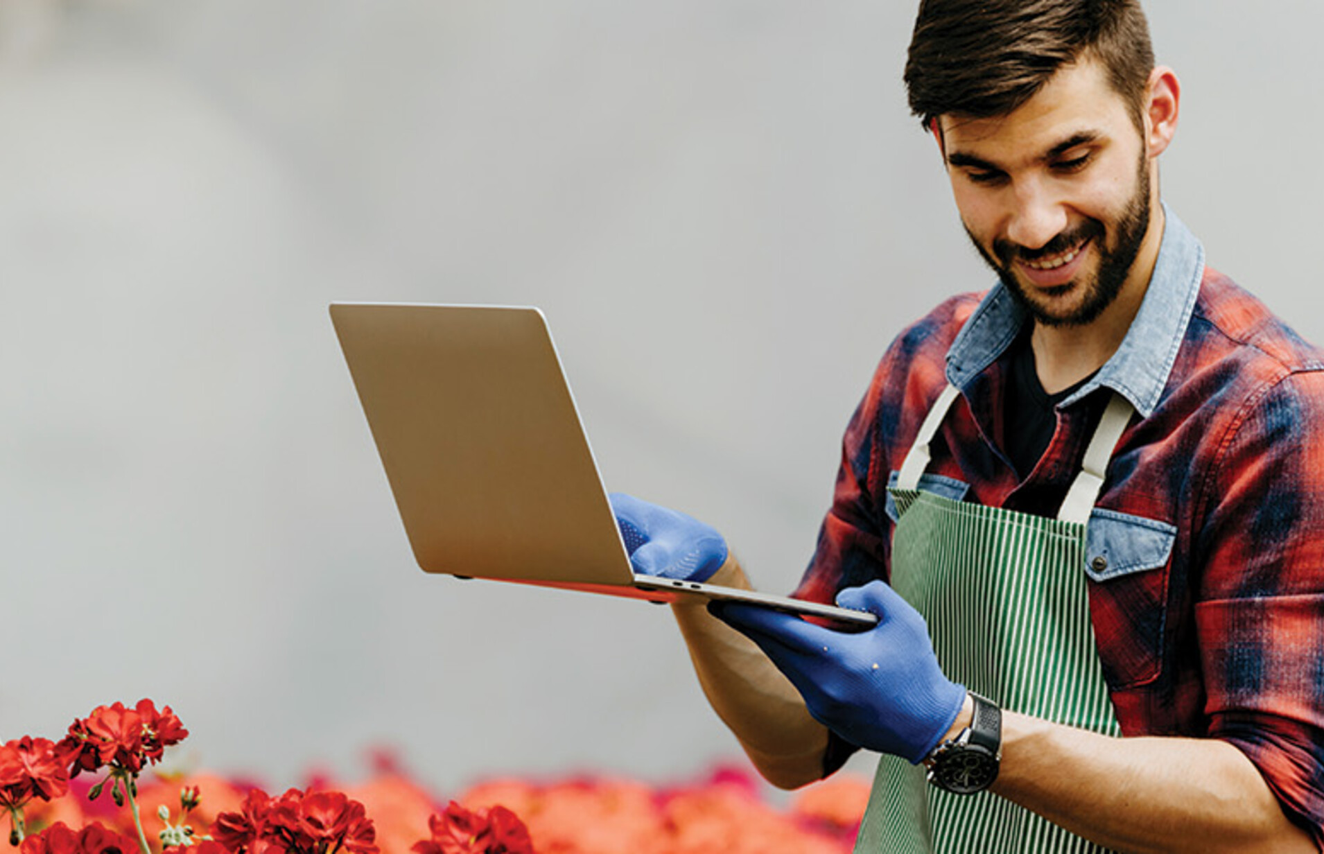 botanist uses laptop in the field