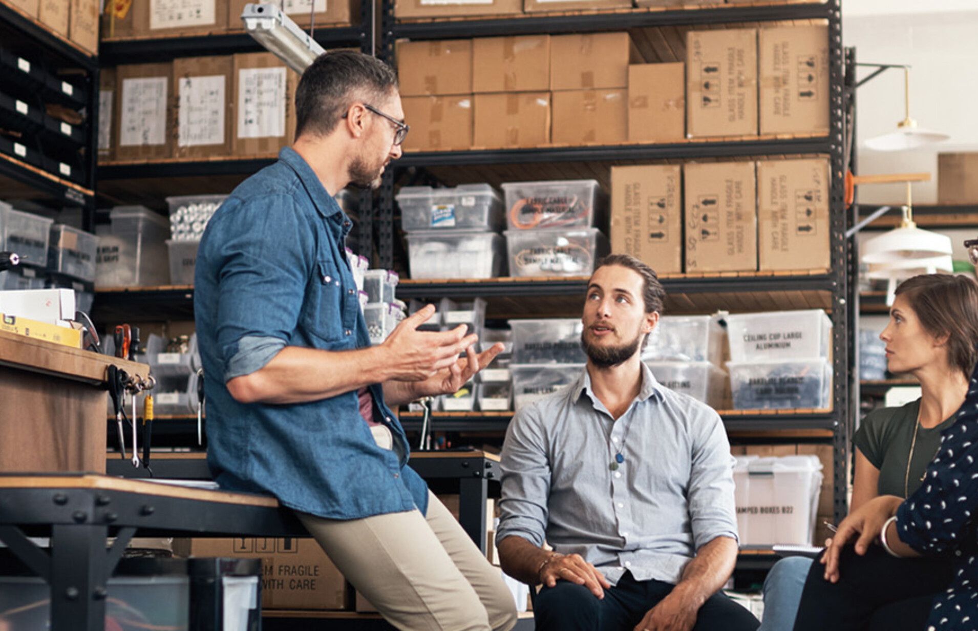 A group of colleagues having a discussion in a workshop