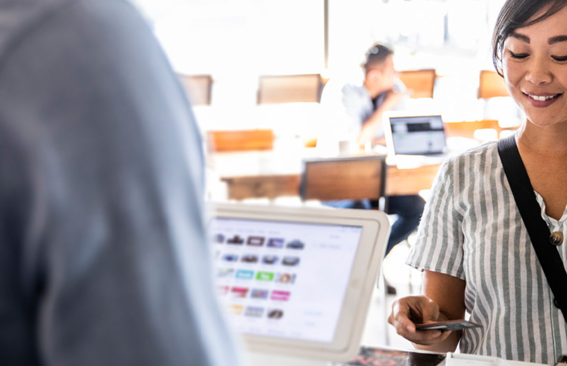 Person buying coffee
