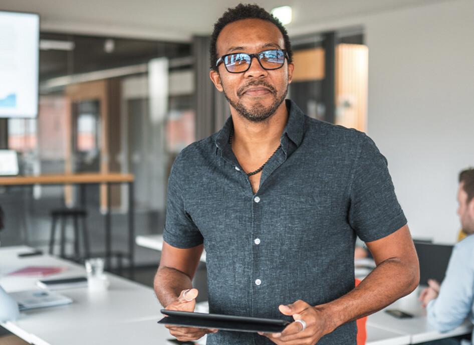 Person using tablet in meeting